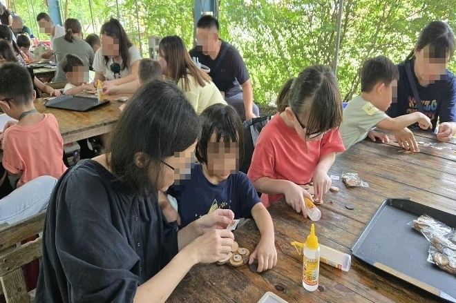 114年早產兒回娘家 大木塊玩耍.jpg